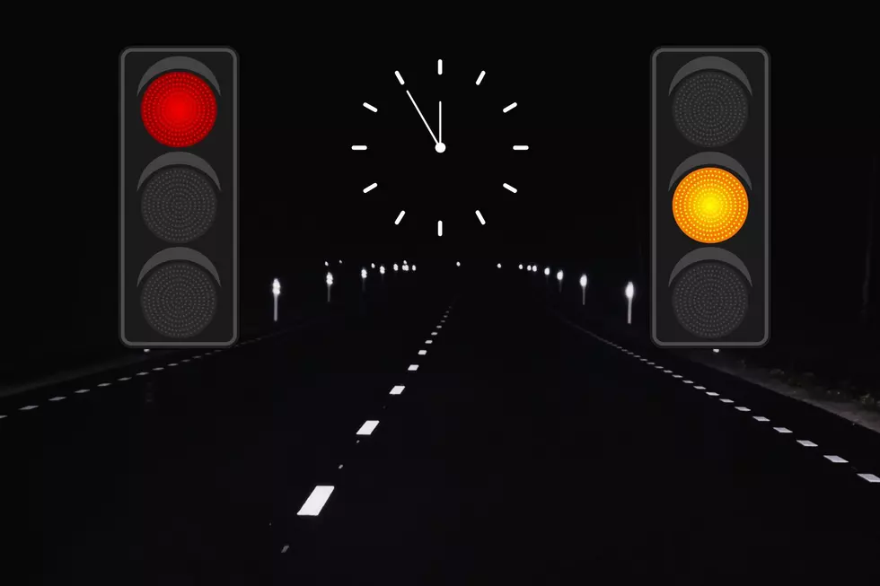 Highway - Late night clock red yellow traffic lights highway