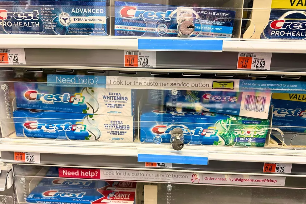 FILE - Tubes of toothpaste are displayed behind a locked, plastic barrier to prevent shoplifters from stealing the products at a store in Manhattan on Jan. 31, 2024. (AP Photo/Ted Shaffrey)