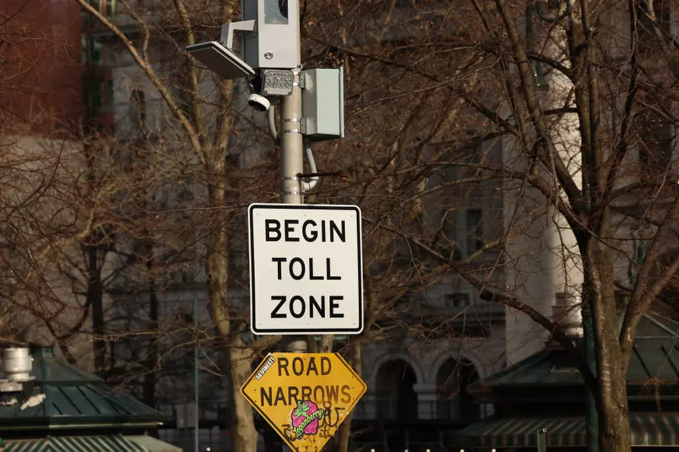 NEW YORK, NEW YORK - FEBRUARY 20: Toll signs are seen on Park Row on February 20, 2025 in New York City. The MTA is suing the Trump administration after U.S. President Donald Trump announced plans to end NYC’s congestion pricing toll. Gov. Kathy Hochul received a letter from the U.S. Department of Transportation saying that it will be terminating its Nov. 2024 agreement with the state. (Photo by Michael M. Santiago/Getty Images)