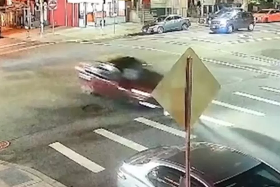 A red sedan hits two women in a Newark crosswalk on Saturday, June 20, 2026. (Screenshot via ABC 7 Eyewitness News)