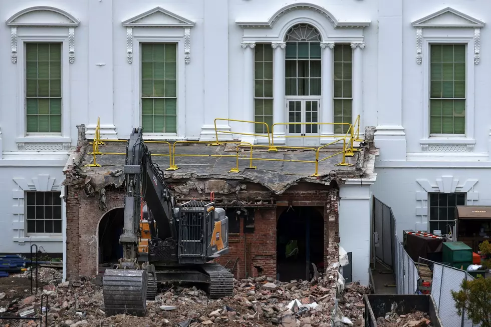 An excavator sits on the rubble after the East Wing of the White House was demolished on October 28, 2025 in Washington, DC