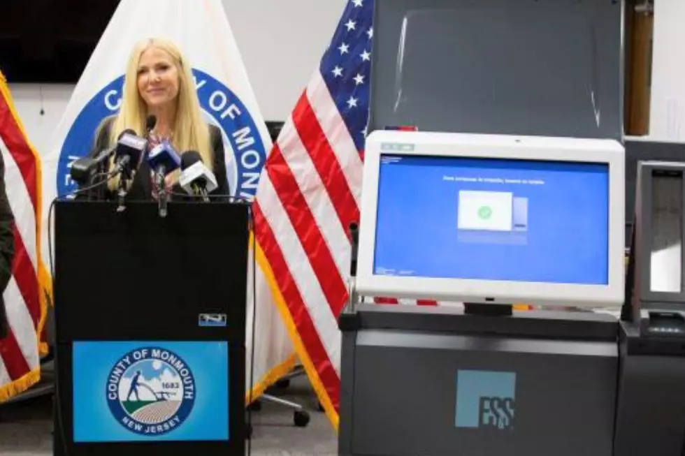 Monmouth County Clerk Christine Giordano Hanlon stands next to an electronic voting machine on Oct. 12, 2021. (Monmouth County Clerk's Office)