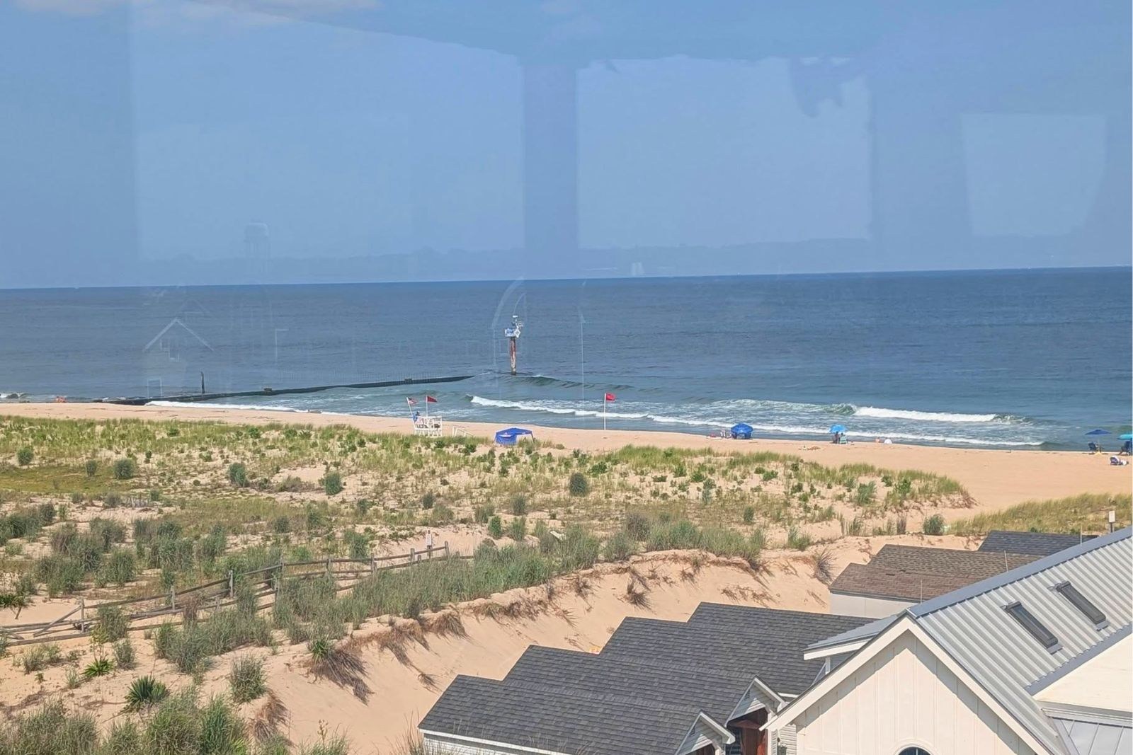 Jersey Shore beach with waves and blue sky