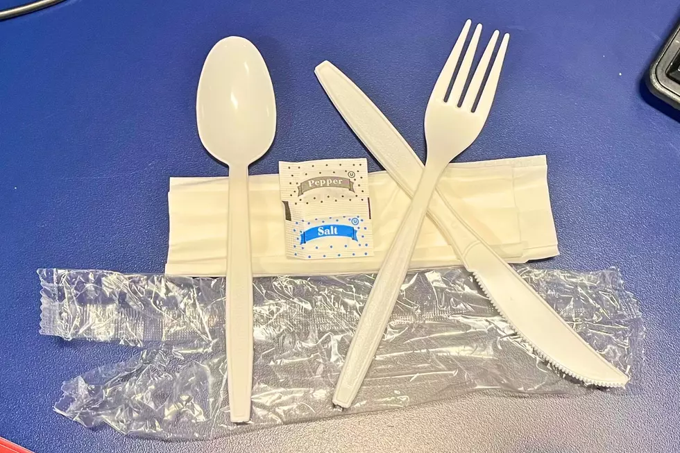 Plastic utensils on a desk