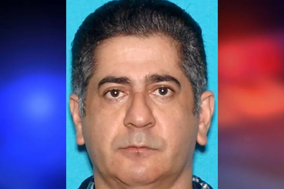 Somerville husband accused of murdering his wife  - Old drivers license photo of accused murderer Ignacio Espinal