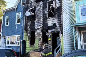Two children killed in devastating Trenton row house fire