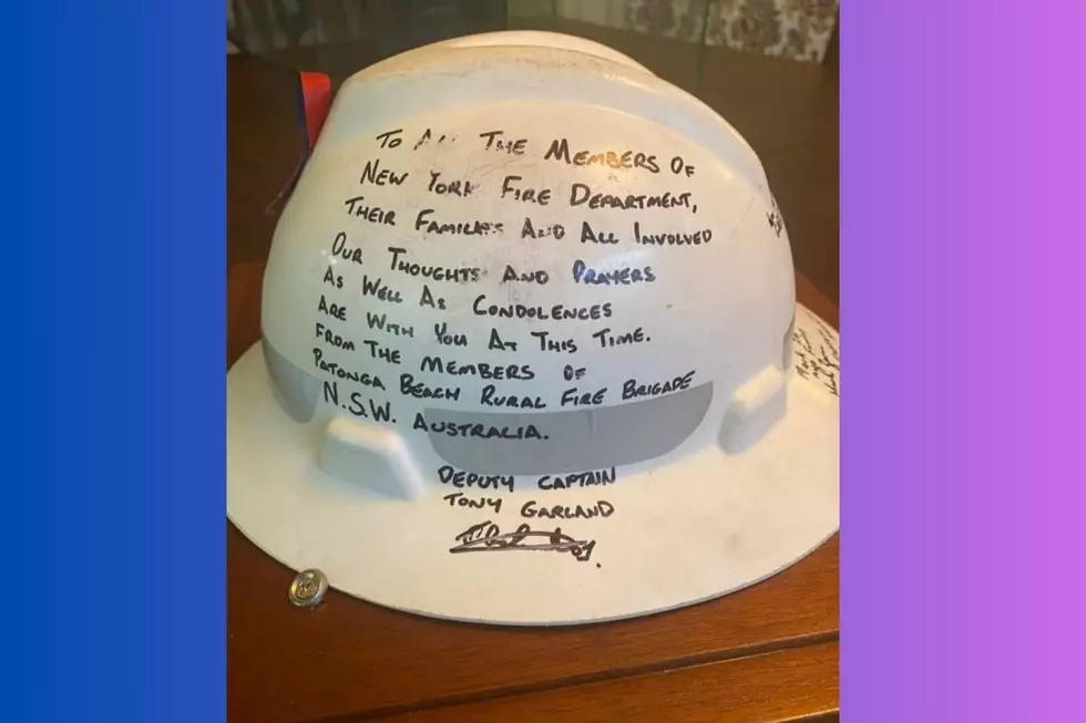 9-11 firefighter helmets from Australia, filled with supportive messages, were sent to the U.S. to honor the FDNY and all those who lost their lives on Sept. 11, 2001 (Peter Cagnassola)