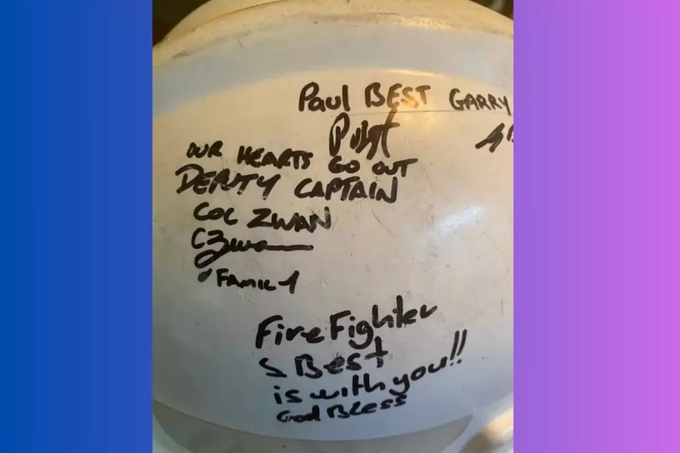 9-11 firefighter helmets from Australia, filled with supportive messages, were sent to the U.S. to honor the FDNY and all those who lost their lives on Sept. 11, 2001 (Peter Cagnassola)