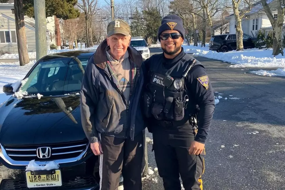 Northfield police officer Malachi Valentine (R) with former Holy Cross High School teacher Mr. Geiger