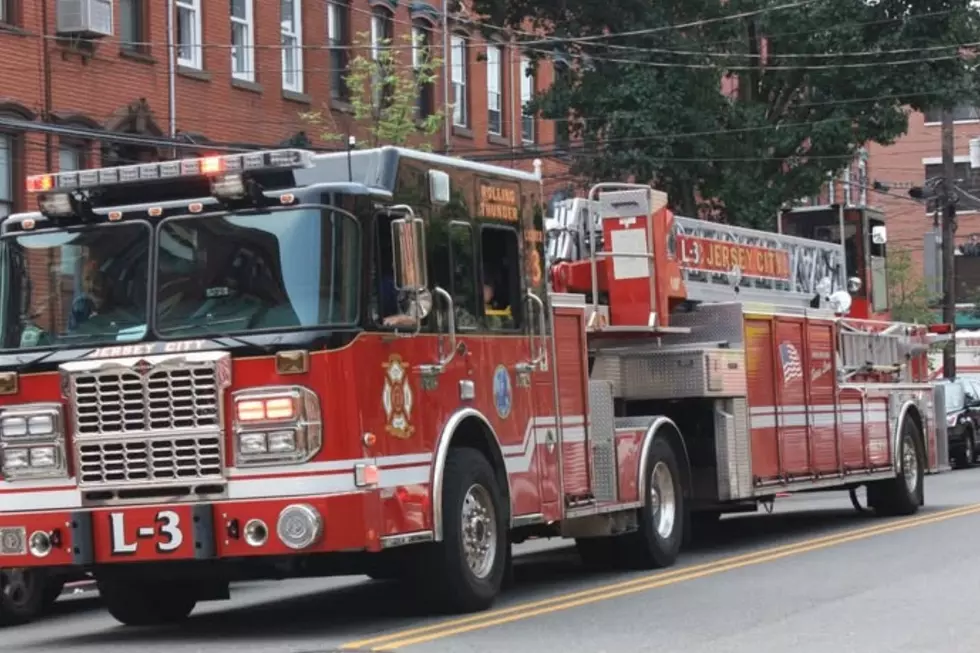 Woman dies in Jersey City fire as firefighters battle through rooms packed with stuff