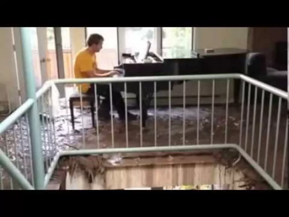 Man Plays Piano In Flooded Colorado Home [VIDEO]