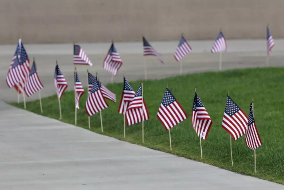 Help Remsen Teen Cover School Lawn With American Flags For Memorial Day