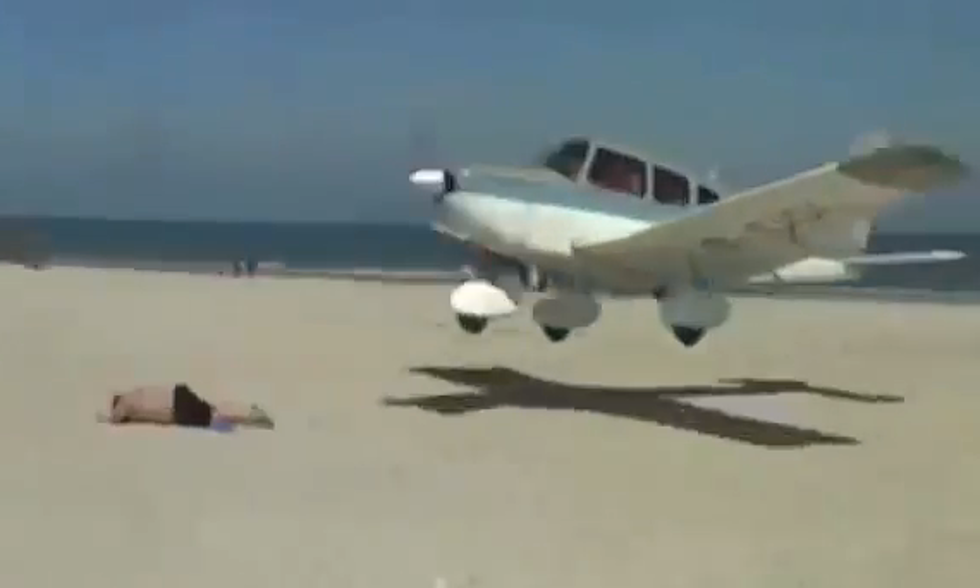 Plane Nearly Lands On Man Lying On Beach [WATCH]