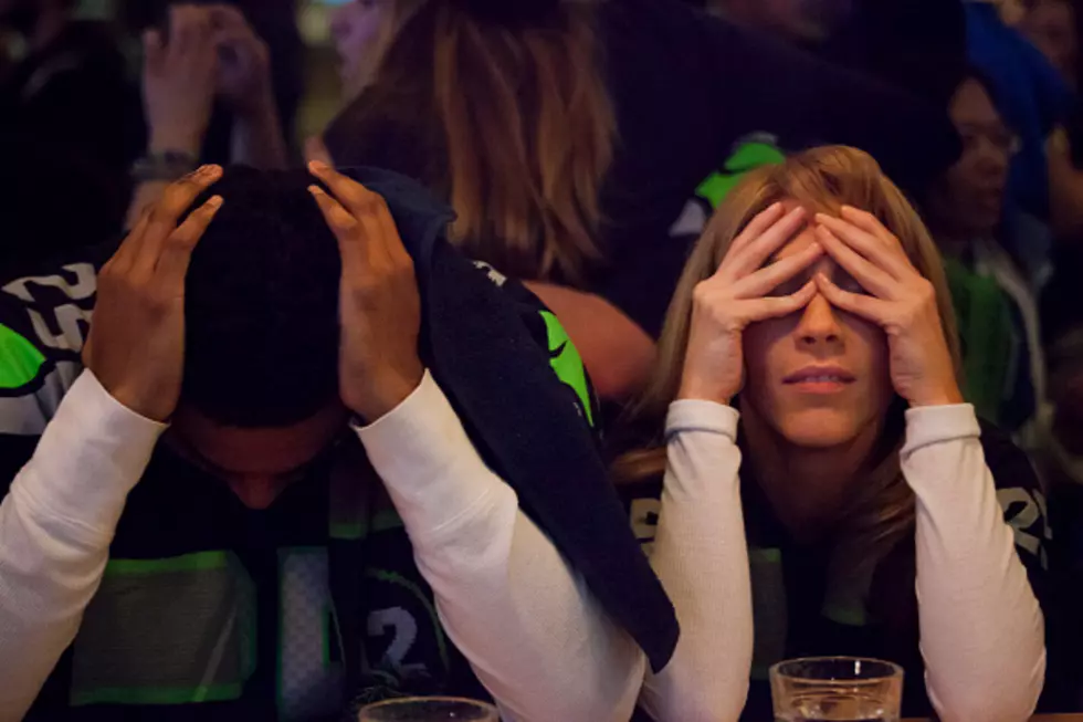 Seahawks Fan Tackles TV After Super Bowl Loss [VIDEO]