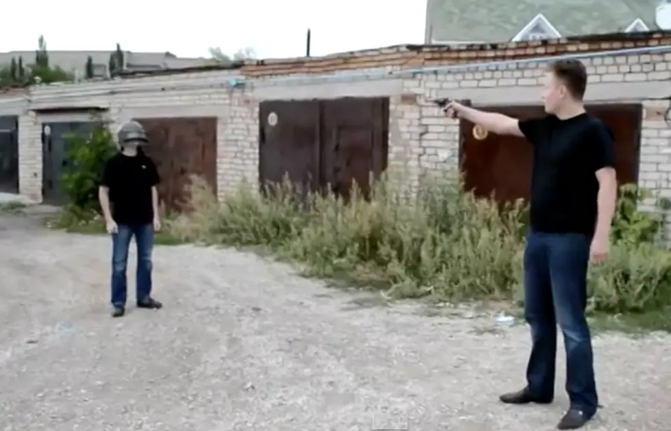 Crazy Man Shoots His Son In The Head To Test His New Helmet [Video]