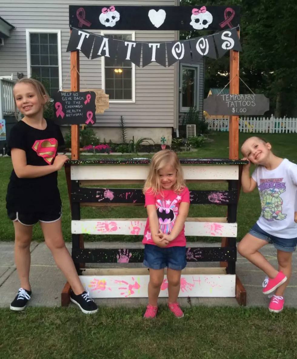 Chenango County Girls Setup Temporary Tattoo Stand For Breast Cancer