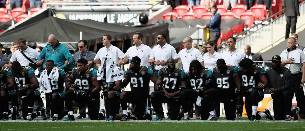 NFL Players Kneel Together During National Anthem