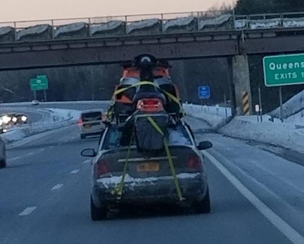 You Know You're From NY When You Strap a Snowmobile On Your Car