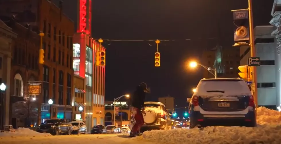 Local Snowboarders Take To Utica Streets After Snowfall