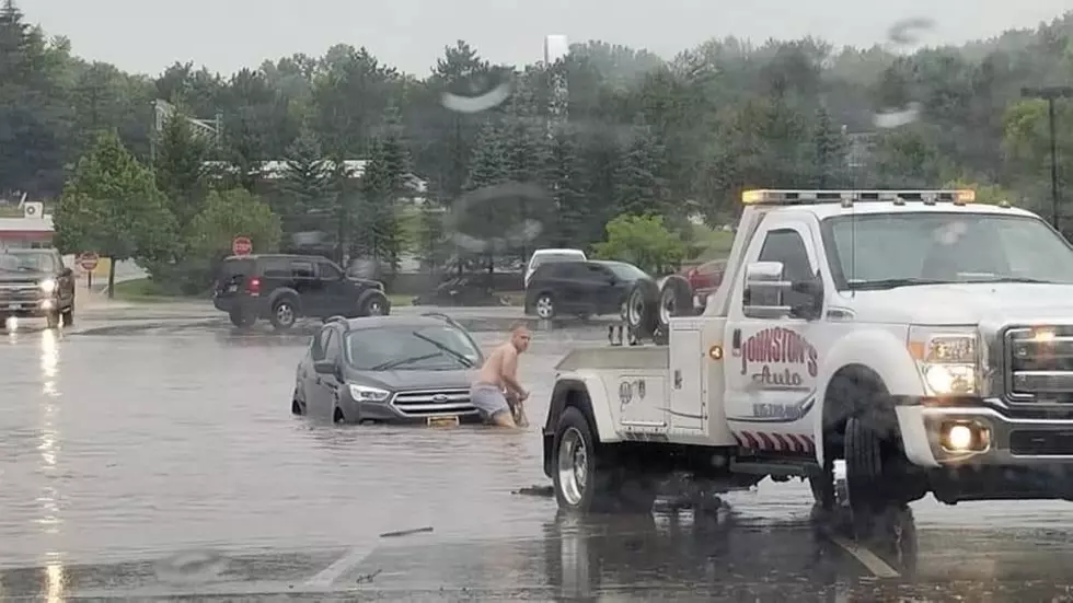 CNY Man Pulls Drivers From Flood in Underwear, Loses Job