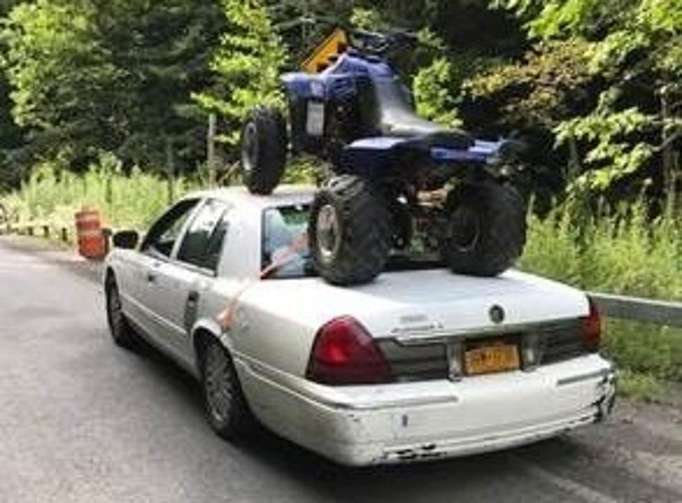 New York Driver Ticketed for Hauling ATV on Top of Car