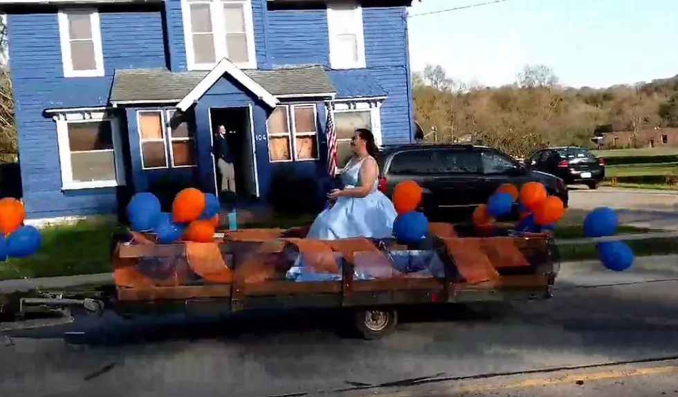 Seniors Don Dresses & Tuxes For Prom Parade in Poland