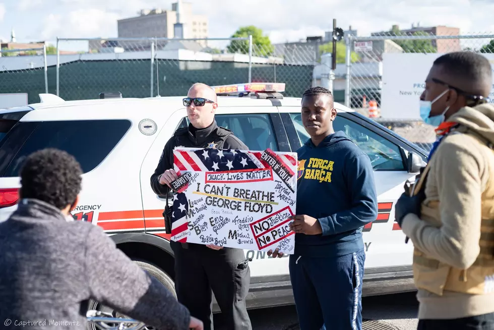 PHOTOS: Police Stand With Protesters in Utica