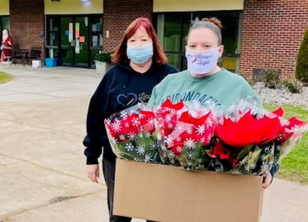 Angels Deliver Poinsettias to Nursing Home Residents