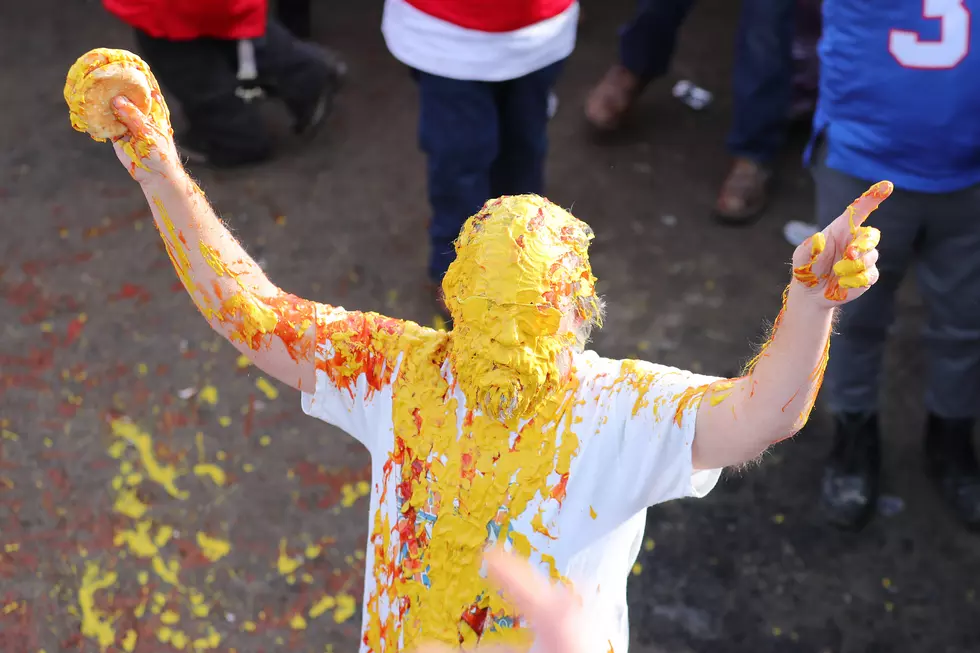 Reporter Prepares for Ketchup, Mustard Shower After Bills Win