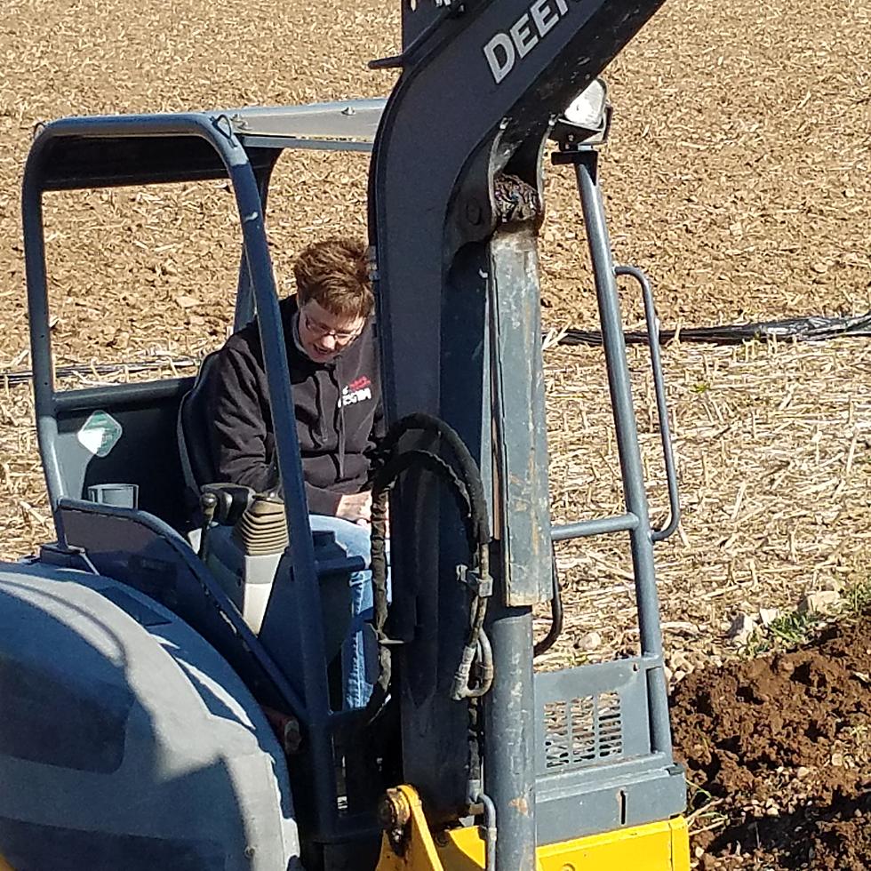 Polly Drives an Excavator, Skid Steer & Walks on Stilts