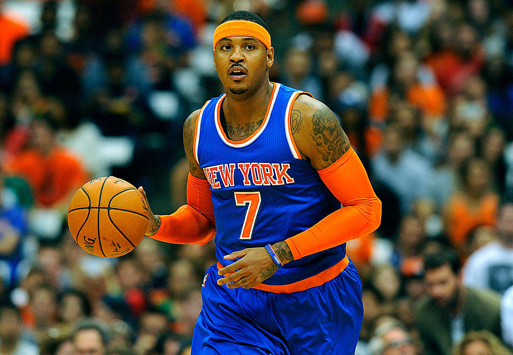Former Syracuse star Carmelo Anthony opts in for $27.9 million