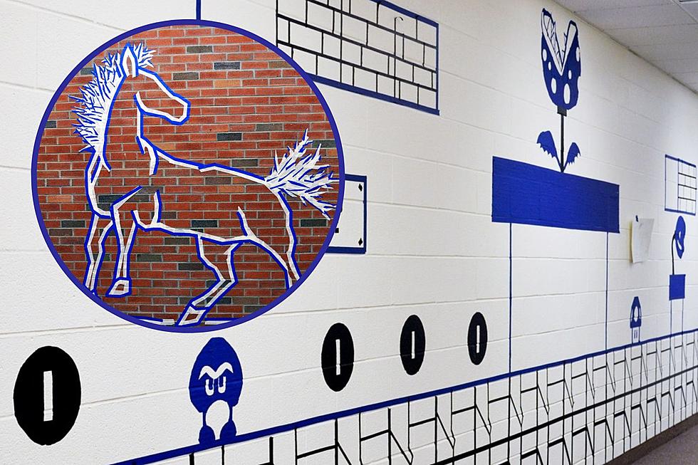 CNY Students Use Tape to Create Unique Artwork on School Walls