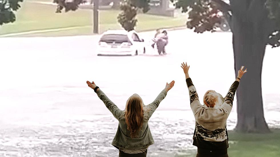 Good Samaritan Saves Stranded Driver from Flooded New York Street