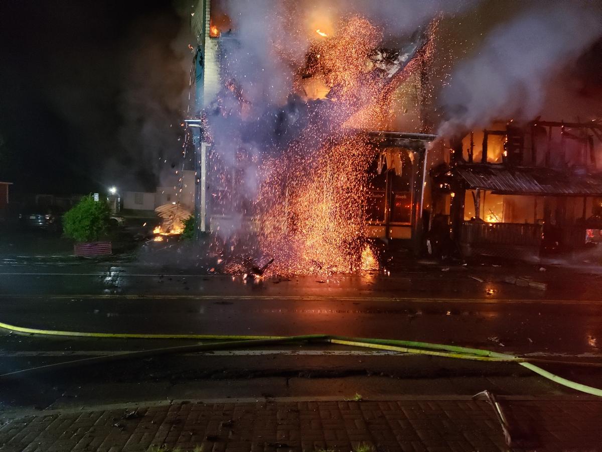 New York Firefighters Rescue Trapped Man as Blaze Destroys Multiple Buildings
