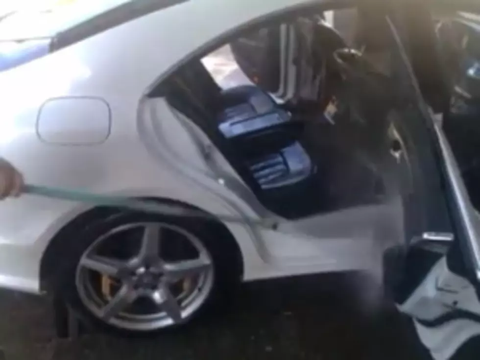 Guy Washes Interior Of Mercedes With Hose [VIDEO]