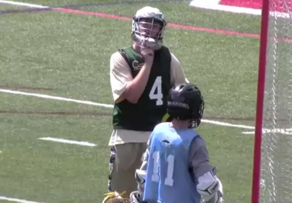 Lacrosse Goalie Makes Save With Mask
