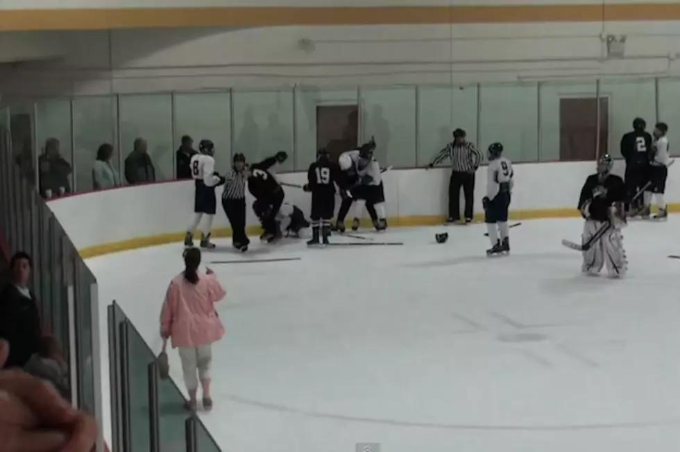 Angry Mom Walks Onto Ice During Youth Hockey Brawl