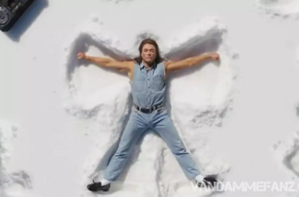 Jean-Claude Van Damme Sings While Making Snow Angels in Beer Commerical
