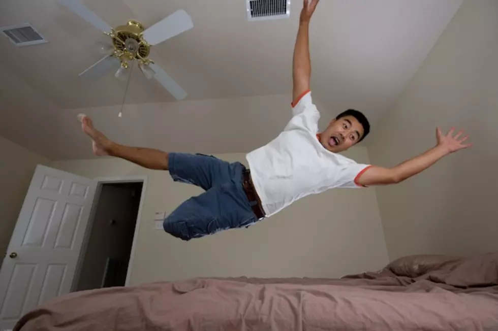 Man Makes His Living Jumping On Mattresses