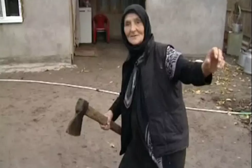 Watch This Russian Grandmother Teach a Wolf a Lesson … With An Axe!