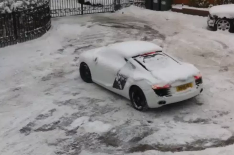Kid Tries To Clean Snow Off Driveway With an Audi R8 — Fails Miserably