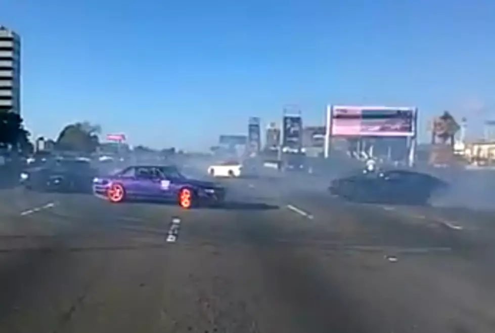 Watch These Morons Close Down a Busy Highway By Doing Donuts in Traffic