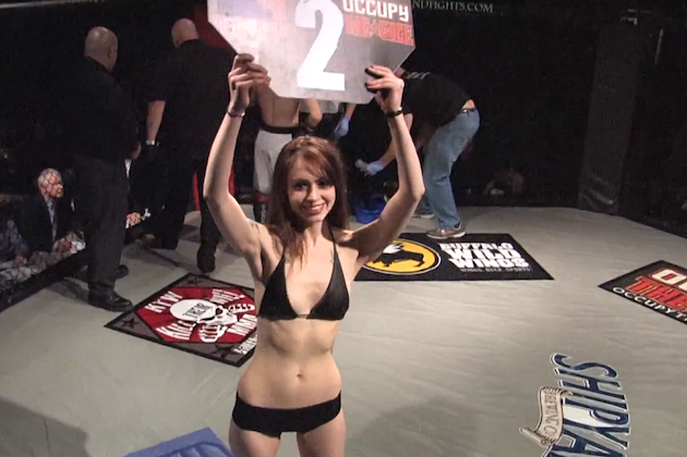 Round Card Girl Doesn’t Realize MMA Fight Is Over