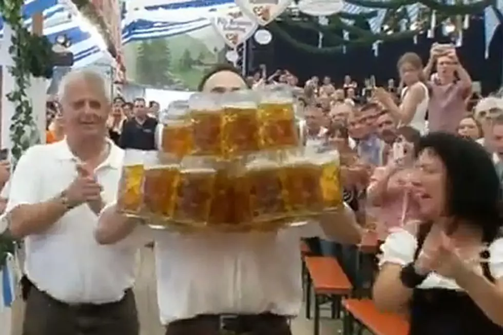 Waiter Sets World Record by Carrying 27 Mugs of Beer