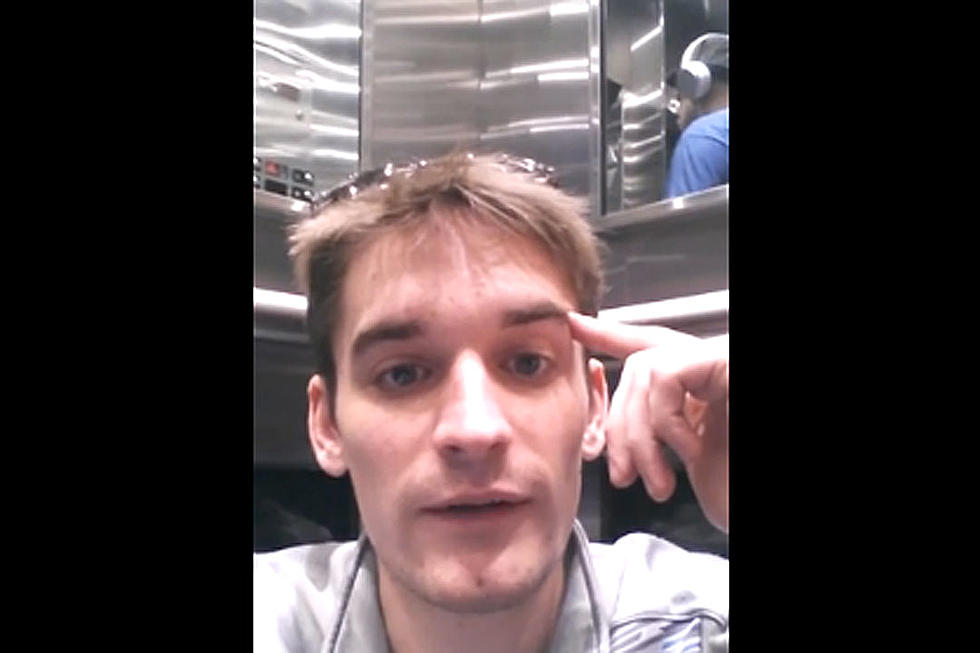 This Poor Sap Is Trapped in an Elevator With a Foul-Mouthed Lunatic
