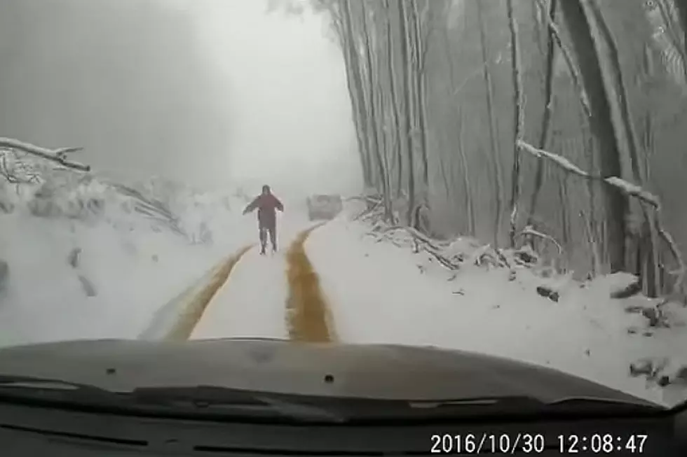 Helpess Driver Chases Sliding Car Down Snowy Road in Ultimate Driving Fail