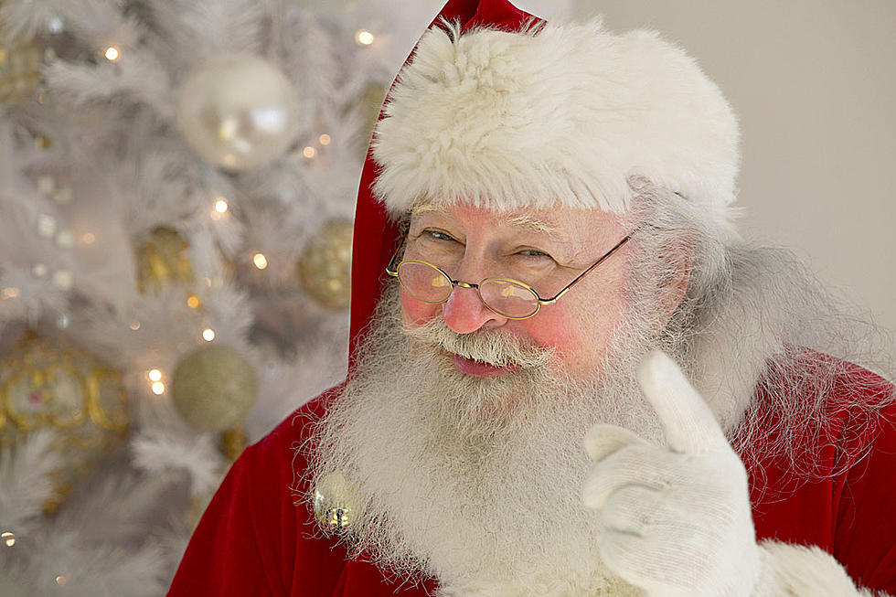 Watch Ultra-Cool Santa Play the Flaming Bagpipes on a Unicycle