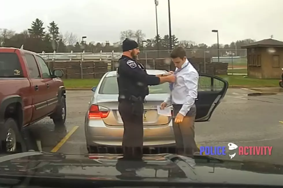 Cop Pulls Over Speeding Driver, Winds Up Tying His Tie
