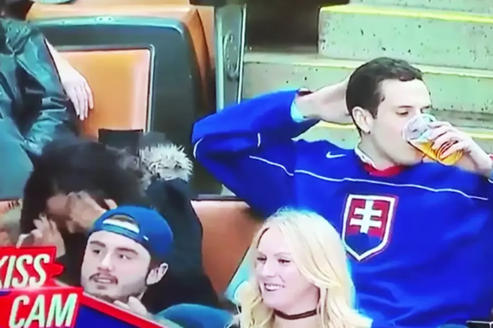 Kiss Cam Hero &#8212; Hockey Fan Smooches His Beer Instead of His Girlfriend