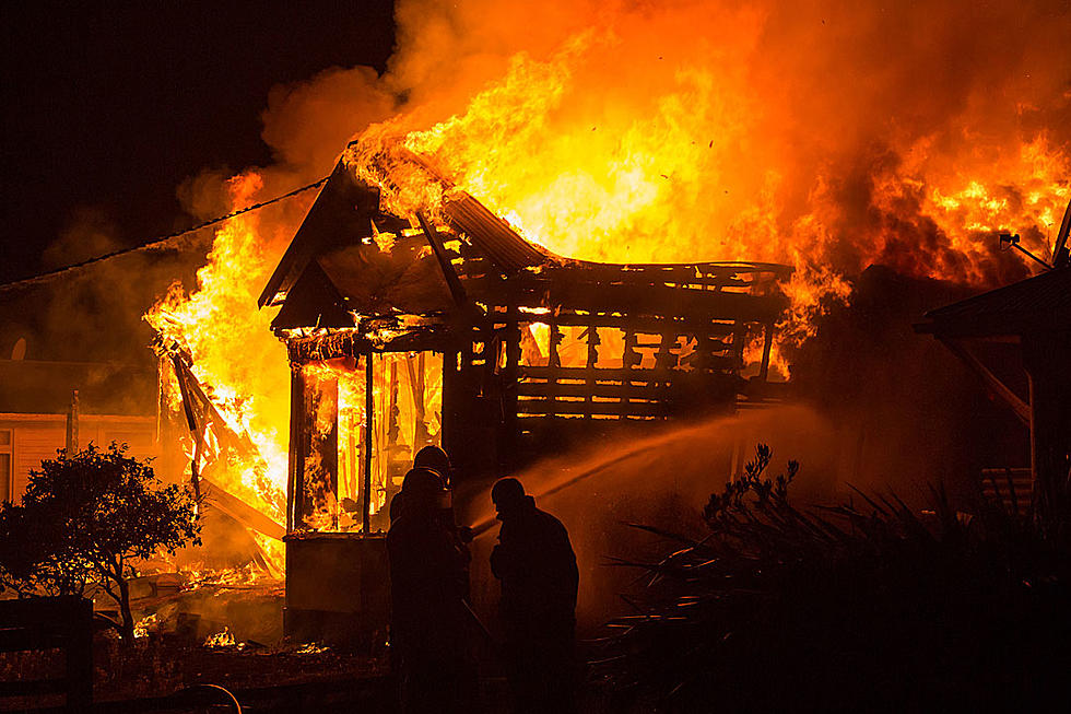 Burning Wall Collapses, Trapping A Firefighter In The Rubble